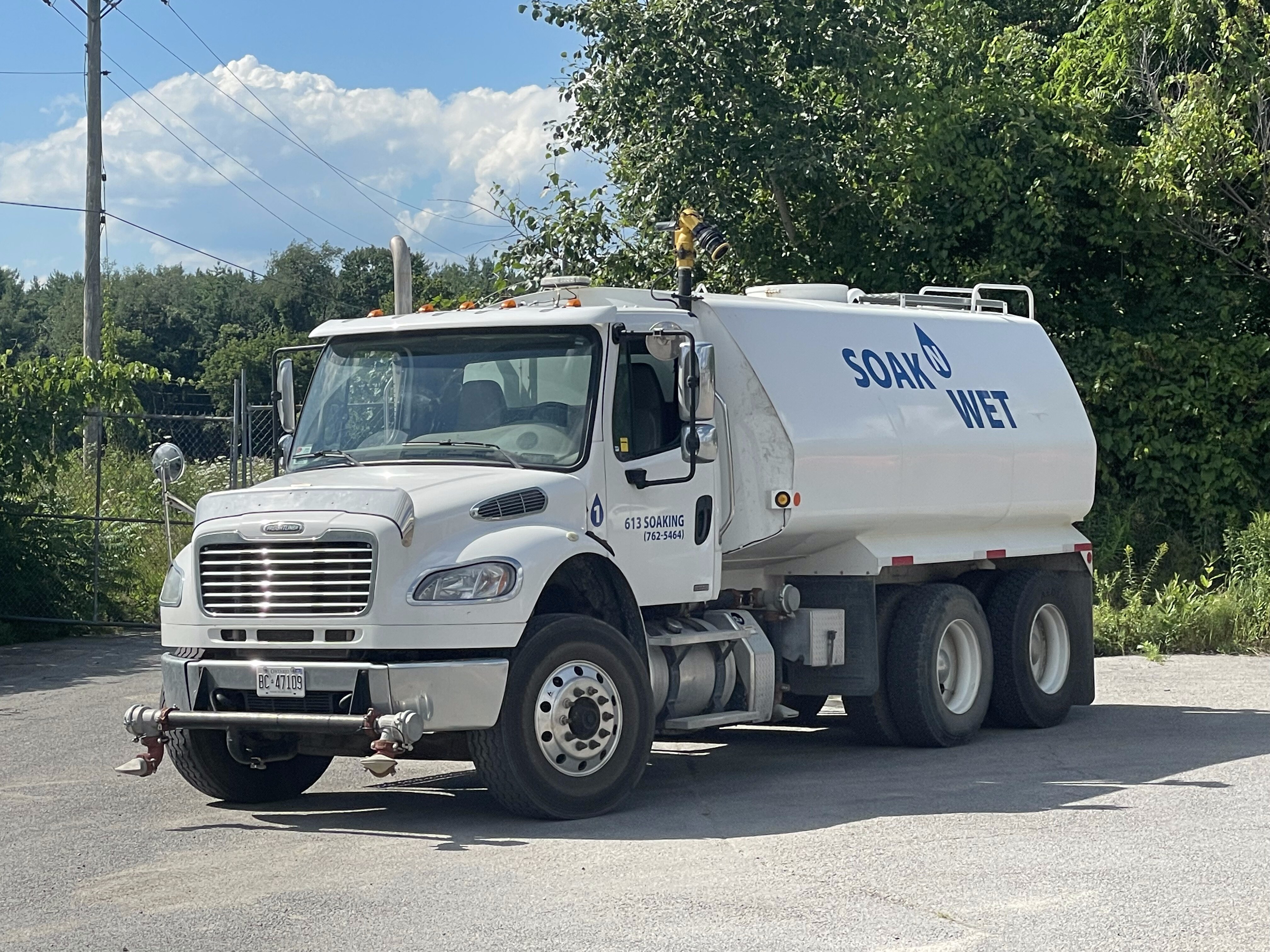 Soak N Wet truck on a rural road near Stittsville